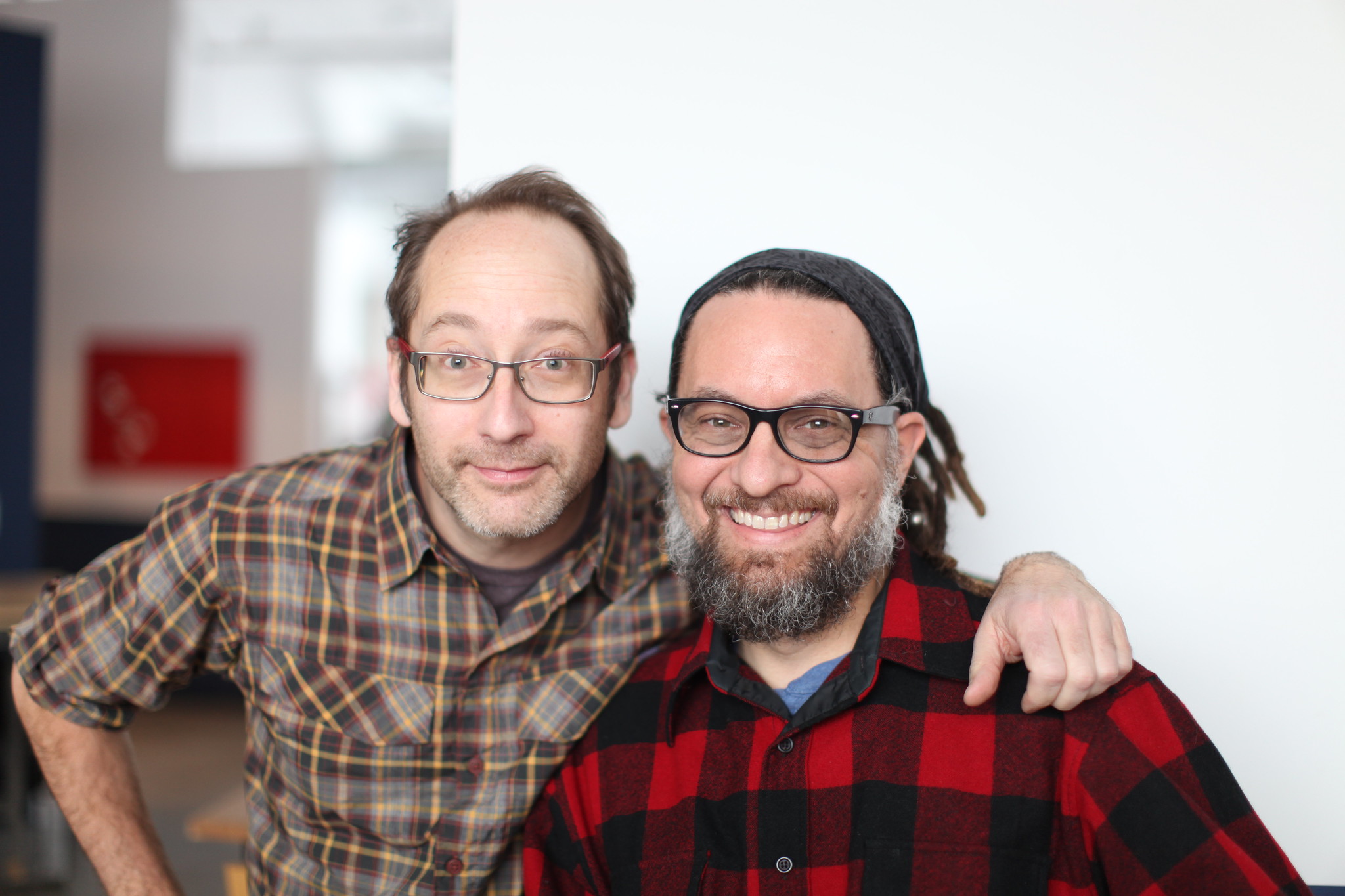 Chuck and Jay, smiling while posing