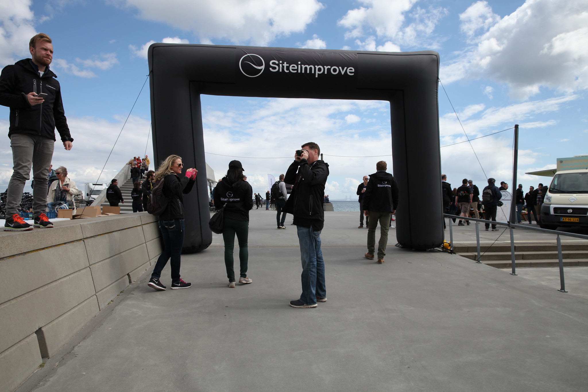 Siteimprove GAAD 2015 event on a beach, with tandem bikes