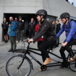 Siteimprove GAAD 2015 event on a beach, with tandem bikes