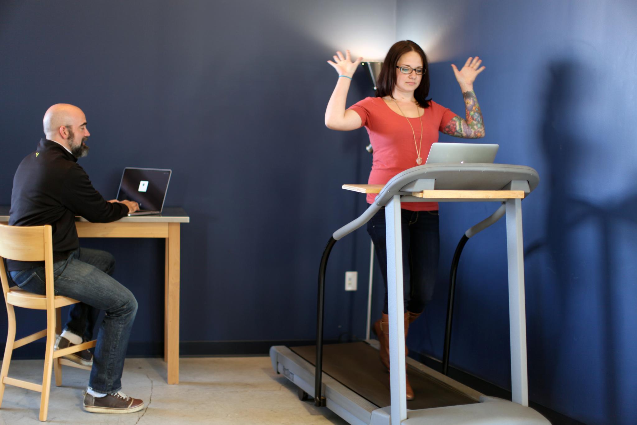 Whitney working from the treadmill desk