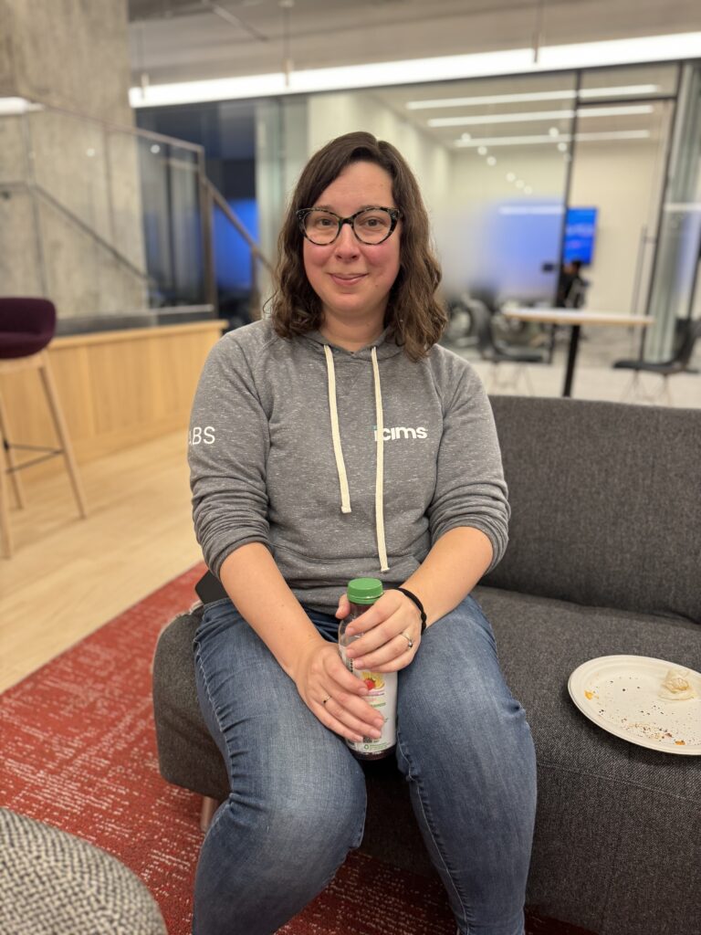 Eileen wearing an iCIMS hoodie