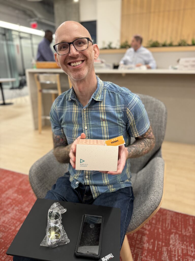 Mike Heath showing off his raffle prize